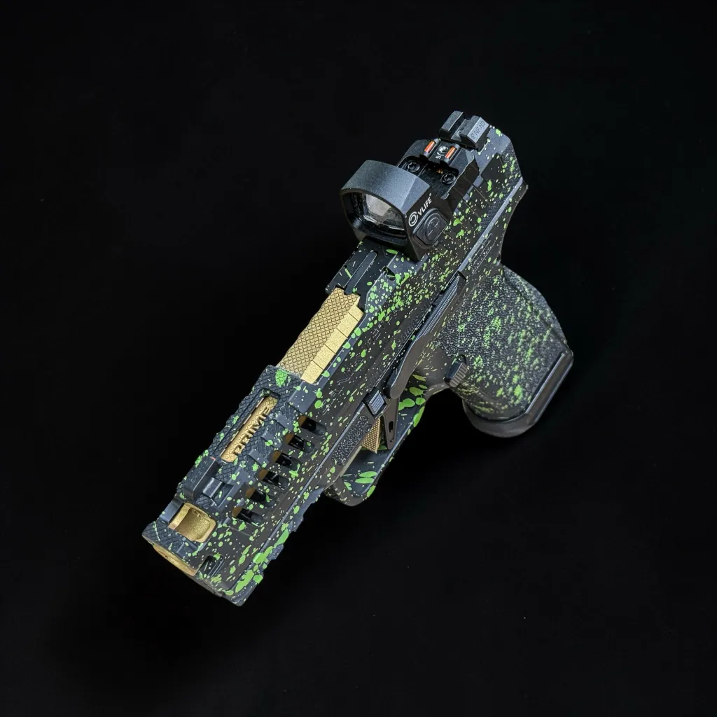 Green patterned custom pistol shown from above